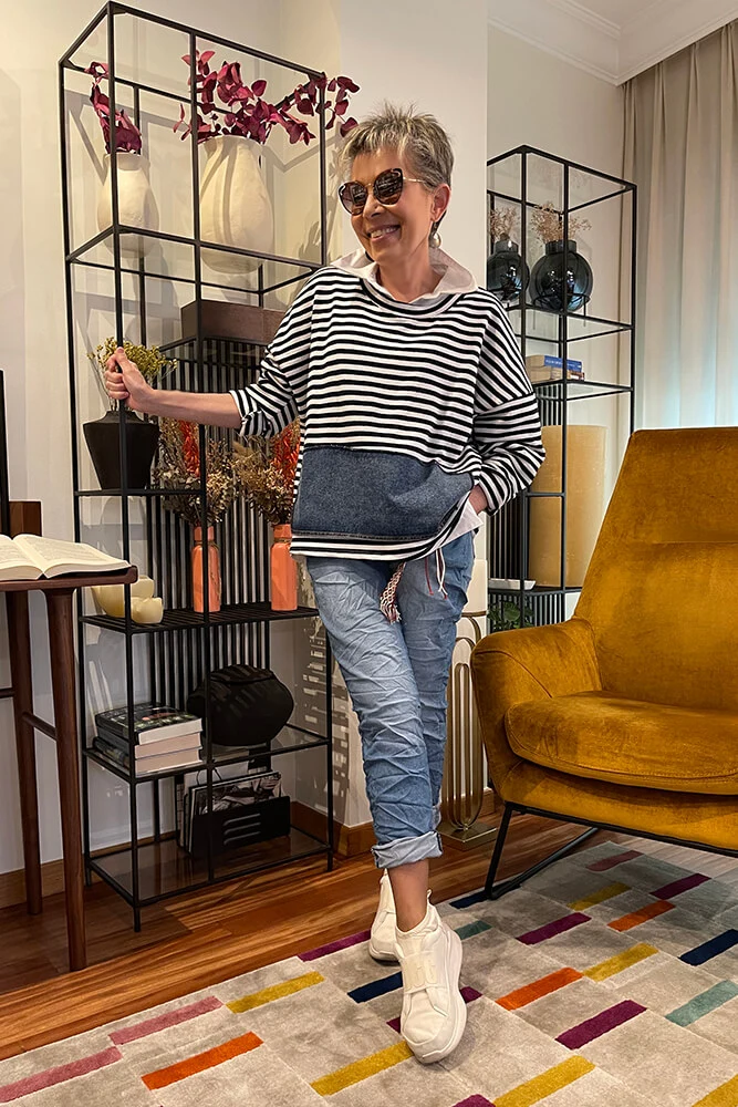 Pantalón vaquero en tejido de efecto arrugado y color desgastado